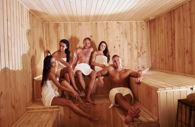 Mature and teen females in Sauna